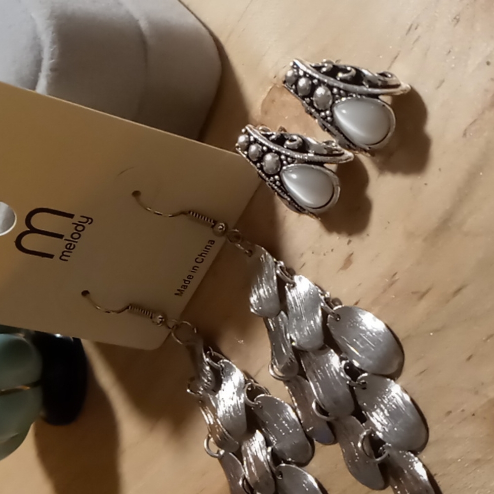 Avon cats eye quartz in silver tone and melody silver tone  chandelier earrings.